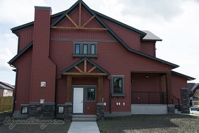 Vinyl Siding with cedar truss Airdrie viklund contracting